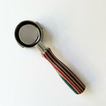 Load image into Gallery viewer, A bottomless portafilter with a premium wooden handle and stainless steel body, designed for Breville series 9 coffee machines.
