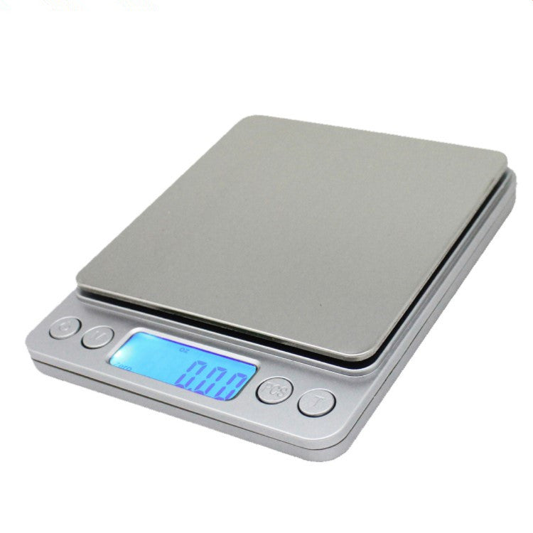 Digital coffee scale with backlit display and two clear bowls